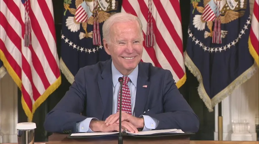 Biden laughs at reporter asking if Trump indictment is ‘politically divisive’