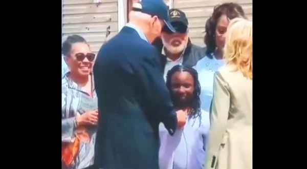 Joe Biden creeps on ANOTHER young girl,this time in Mississippi