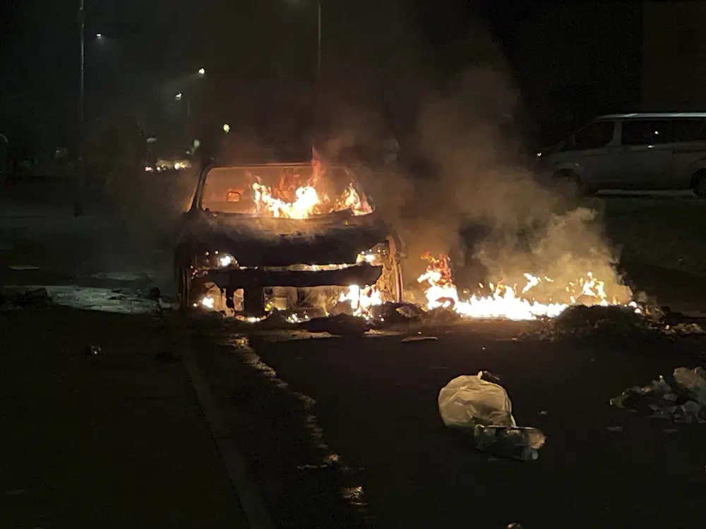 Cars set on fire in Welsh capital as police face ‘large scale disorder’