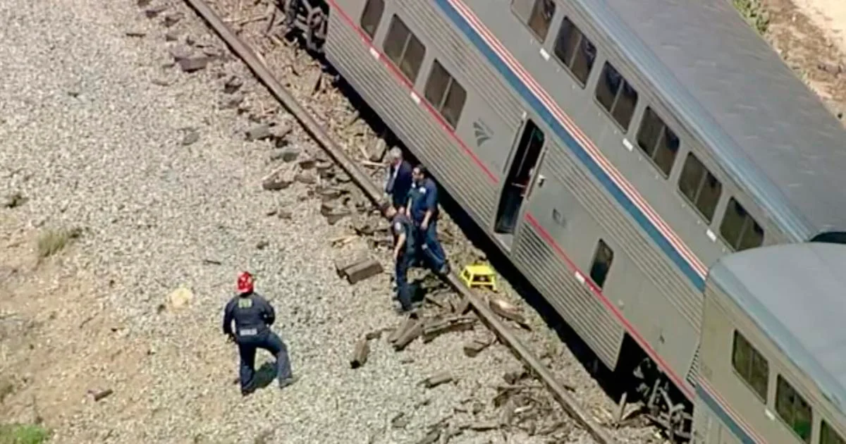 Amtrak train with 198 passengers derails after hitting truck on tracks in Southern California