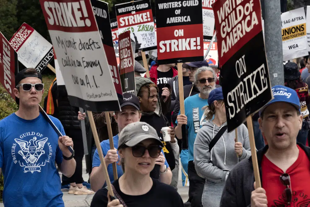 Hollywood writers at rally say they’ll win as strike reaches 50 days