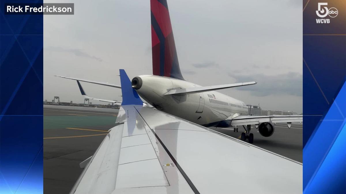 Love tap on the tarmac: Video shows Delta and United planes in slow-motion bump at Boston airport