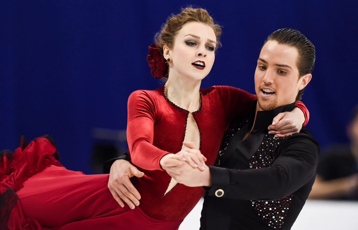 Canadian Olympic figure skater killed in 7-car collision; infant son injured