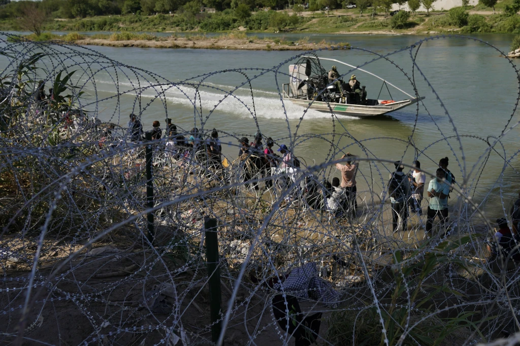 Texas wants the power to arrest and order migrants to leave the US. Can it do that?