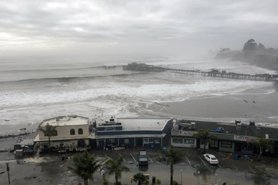 Powerful surf hits West Coast and Hawaii, flooding some low-lying areas