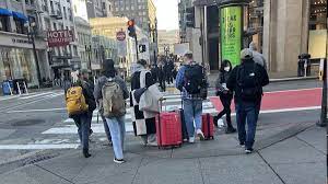 Nothing to see here! San Francisco journalist shares photo of tourists walking down ‘GUTTED’ main street in crime-ridden city, where almost all shops have now closed