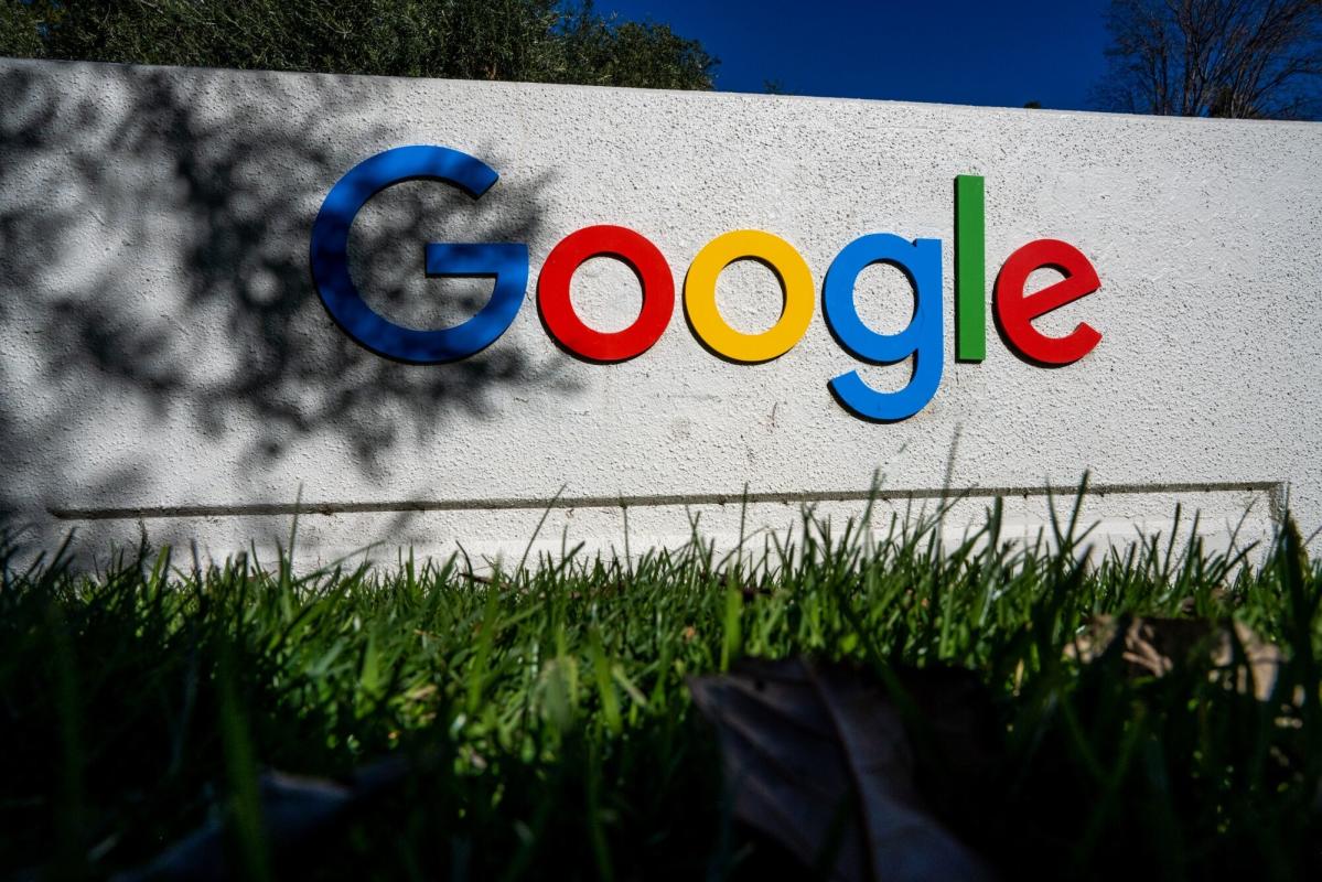 Google parent Alphabet hits $2tn valuation as it announces first dividend