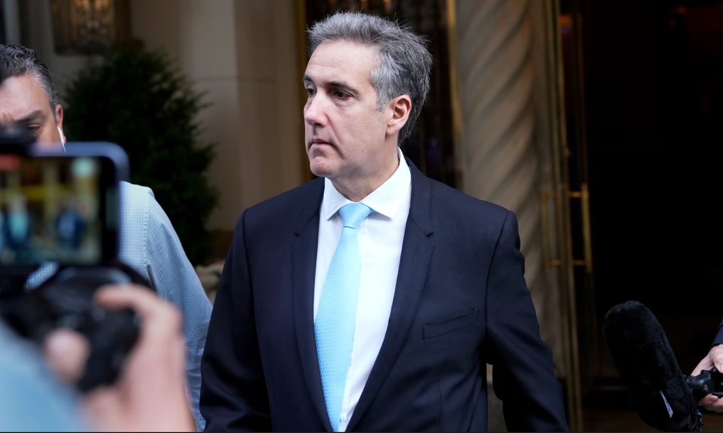 Michael Cohen tells hush-money jury of phoney invoices to cover up payment