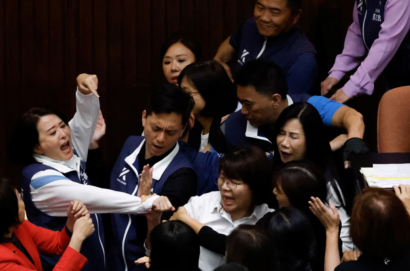 Taiwan lawmakers exchange blows in bitter dispute over parliament reforms