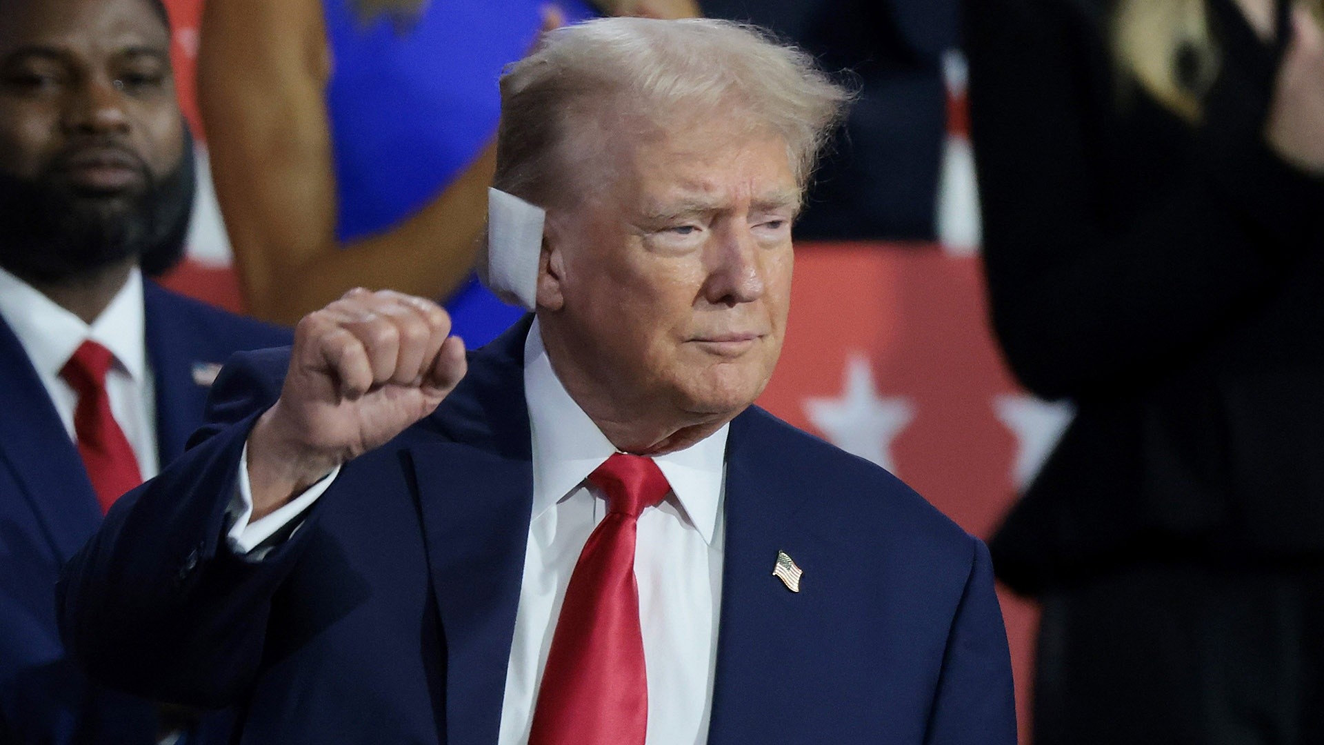 Trump soaks up cheers at GOP convention in first public appearance since shooting