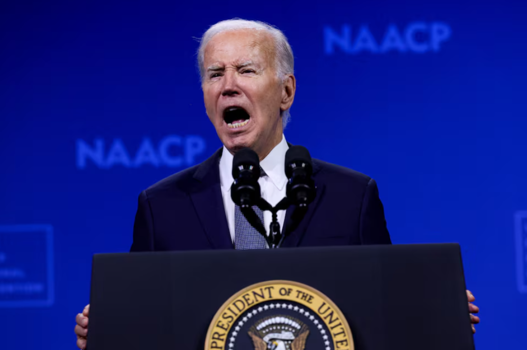 Biden pledges ‘I am all in,’ criticizes Trump on policy