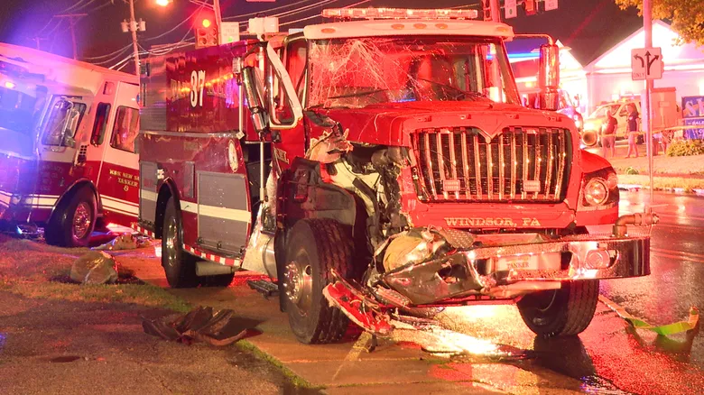 2 fire tanker trucks heading to large warehouse blaze crash, injuring 7 firefighters