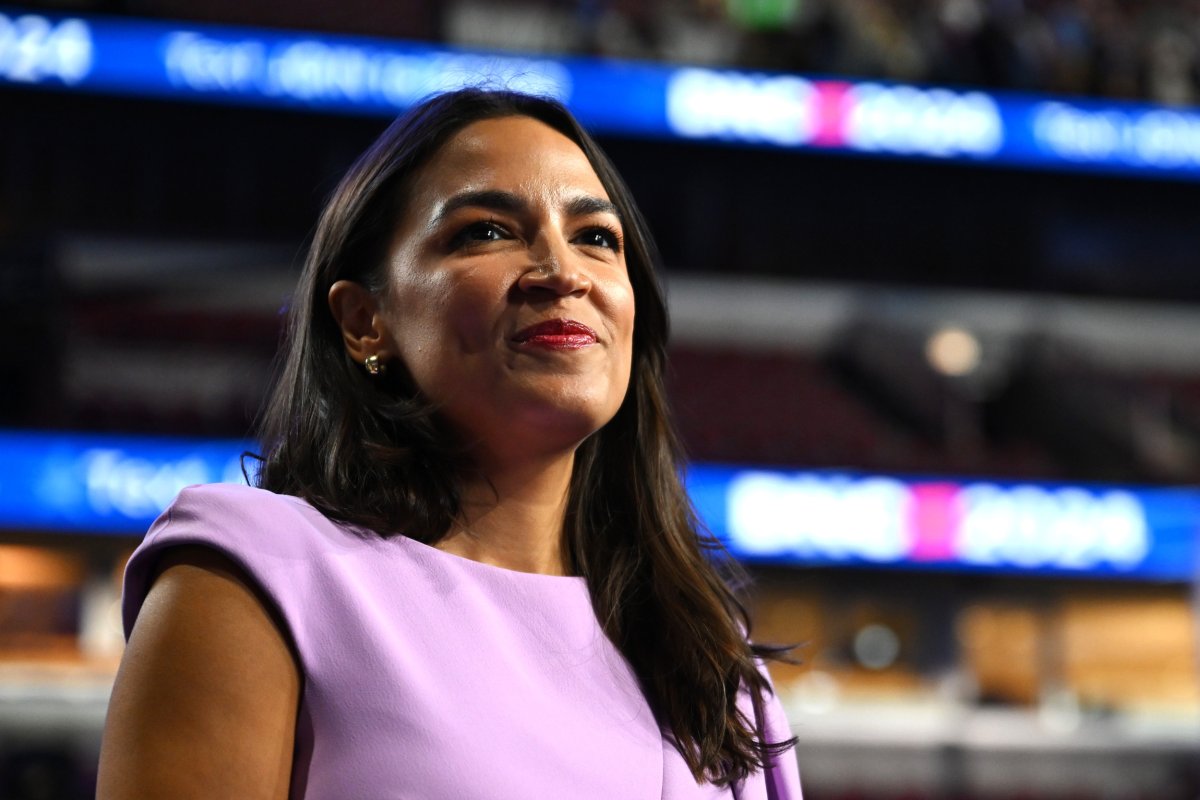 Donald Trump Would Sell US ‘For a Dollar,’ AOC Warns at the DNC