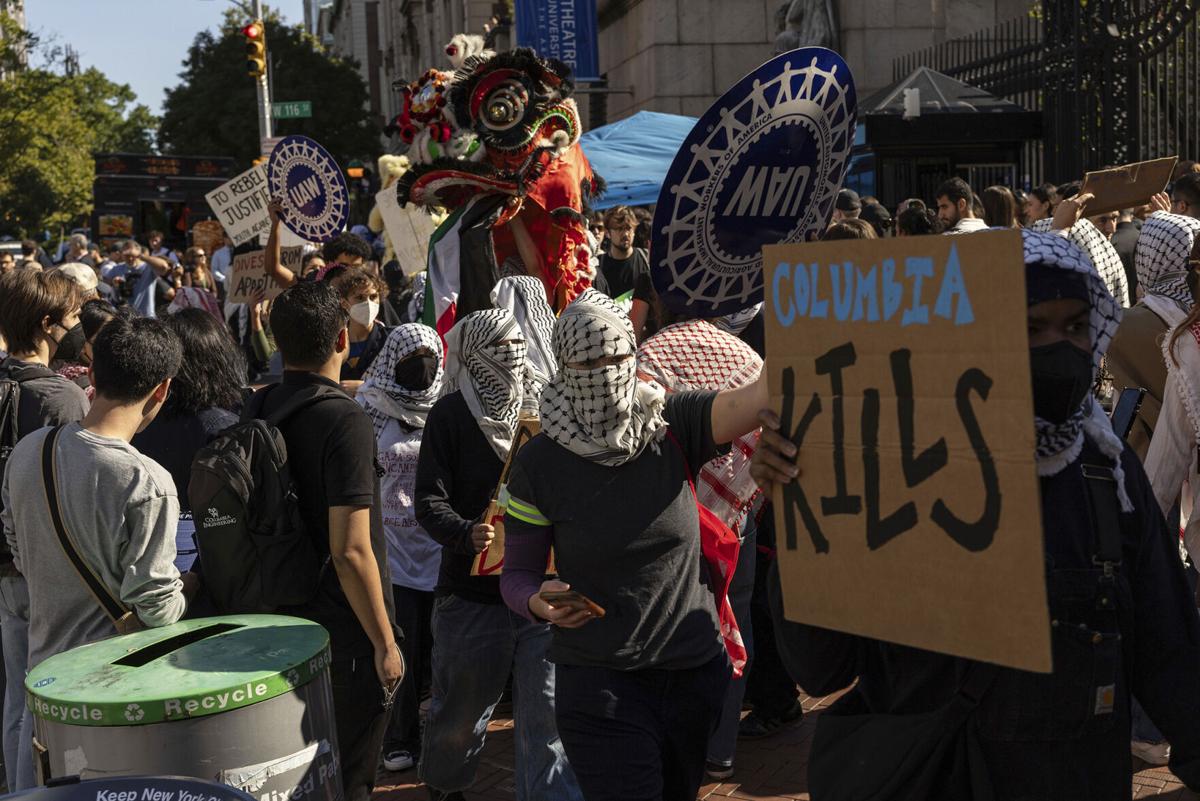 Pro-Palestinian protesters demonstrate outside Columbia University as classes resume