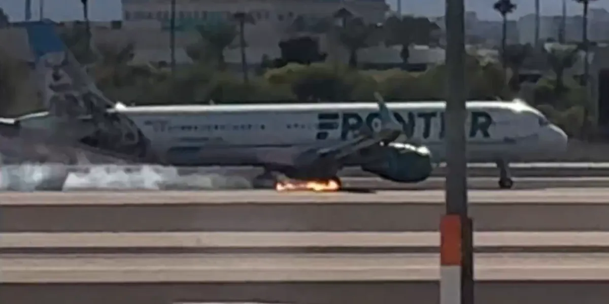 Frontier Airlines jet appears to catch fire while landing at Las Vegas airport, FAA and NTSB investigating