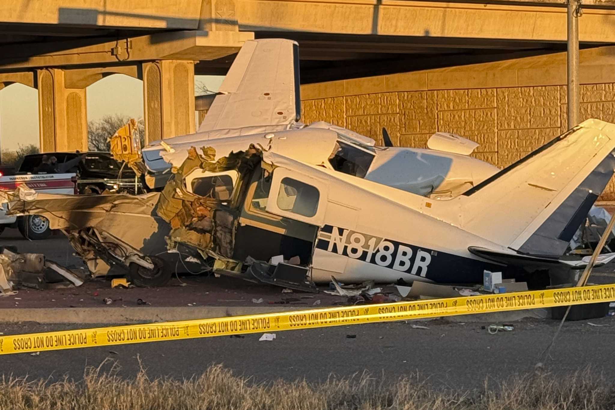 Propeller plane crashes onto a Texas highway, sending 4 people to hospitals