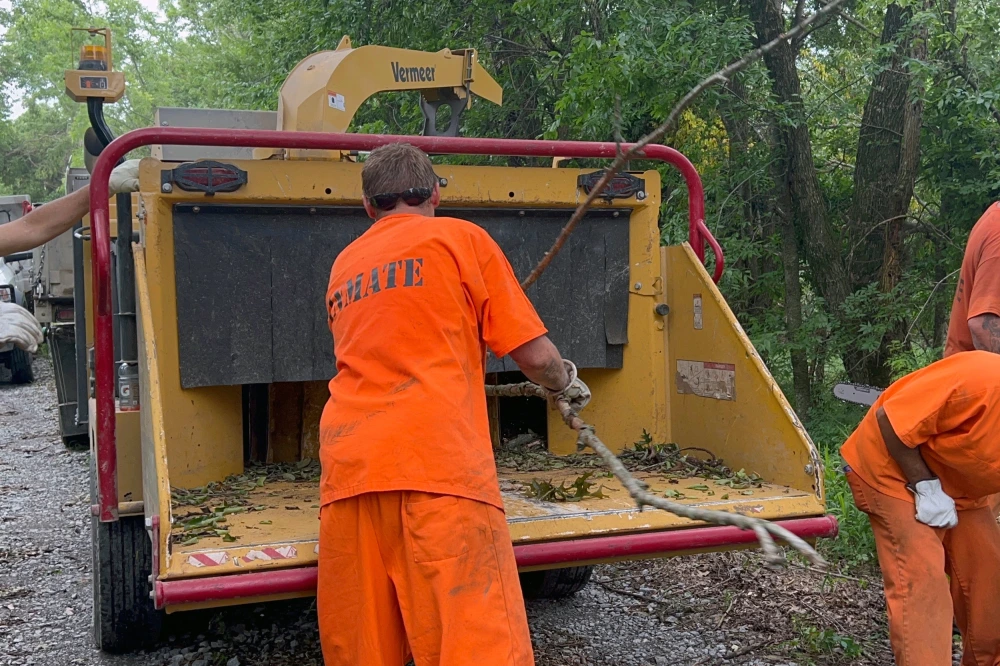 Oklahoma inmates clear debris to free family trapped for more than a week