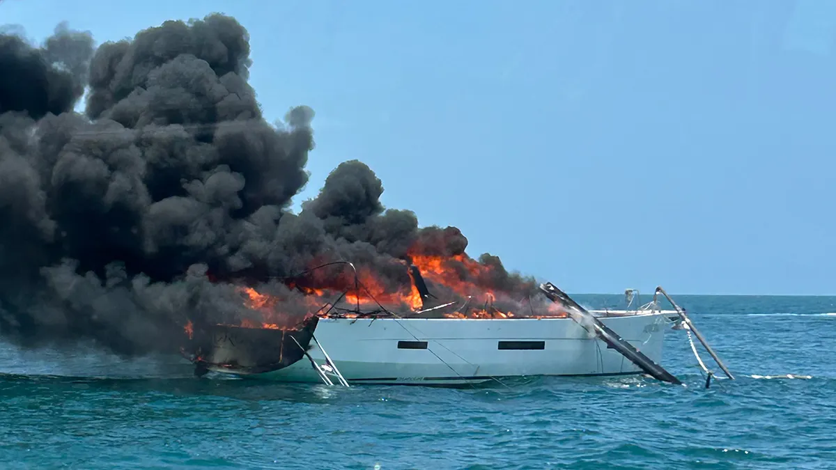 Four people were rescued from a burning boat Saturday off the coast of Cape Canaveral, Florida.