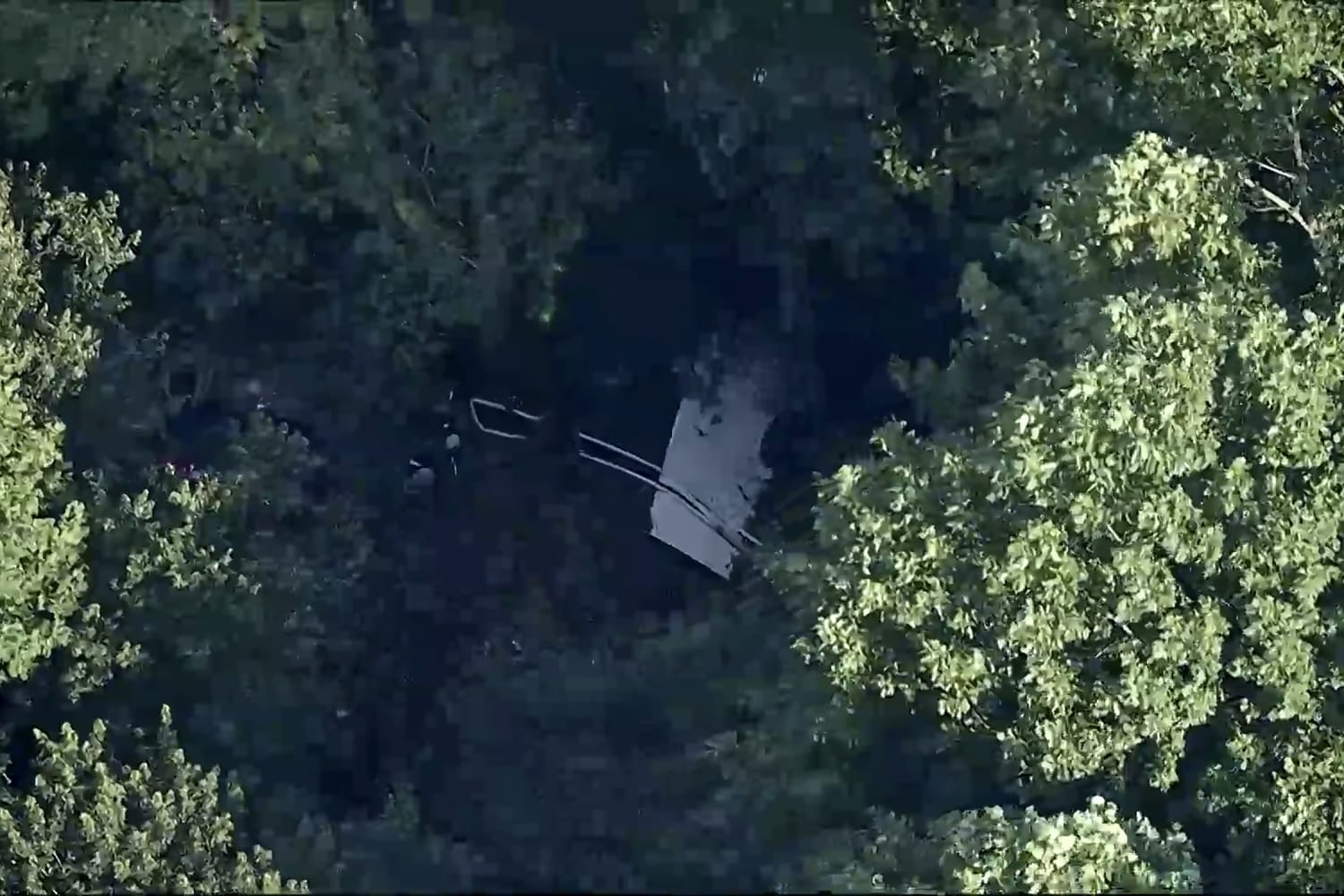 Skydiving plane goes off New Jersey runway into woods, sending 15 to hospital