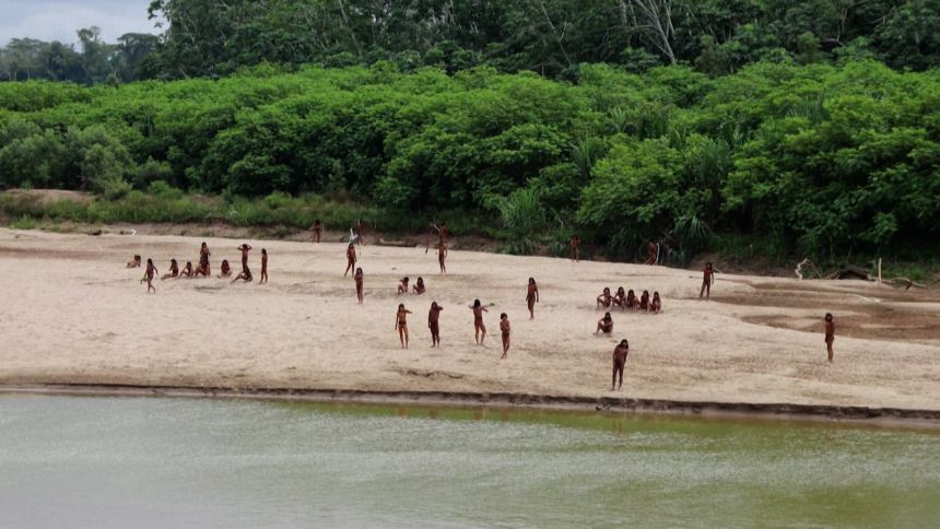 Isolated Amazon tribe seen near logging bridge site, alarming rights group