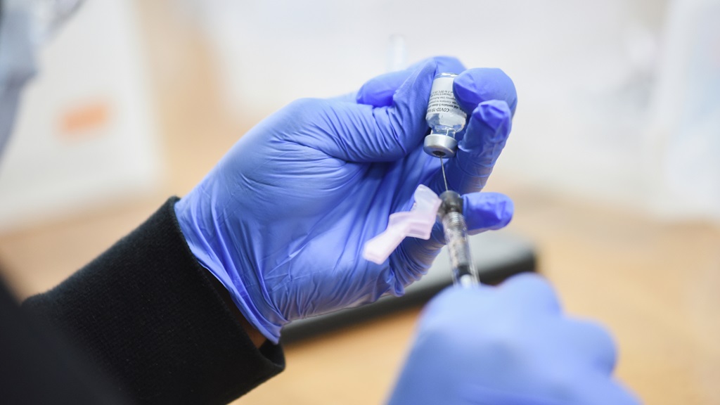 FDA approves updated COVID vaccines with restrictions