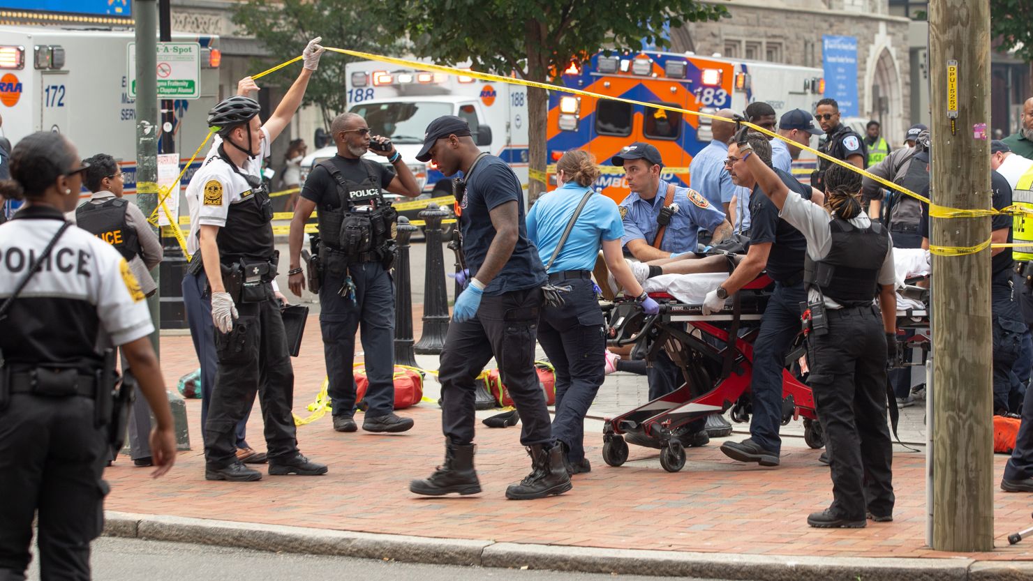 Virginia police seek man in connection with shooting that killed 1 woman, injured 2 officers