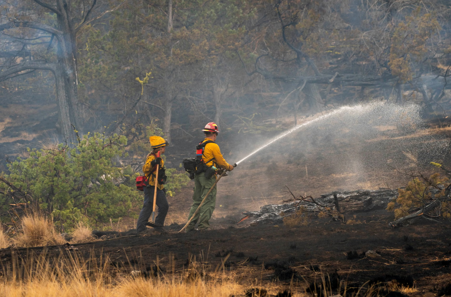 California and Oregon fire crews battle several blazes as forecasters warn more may spark