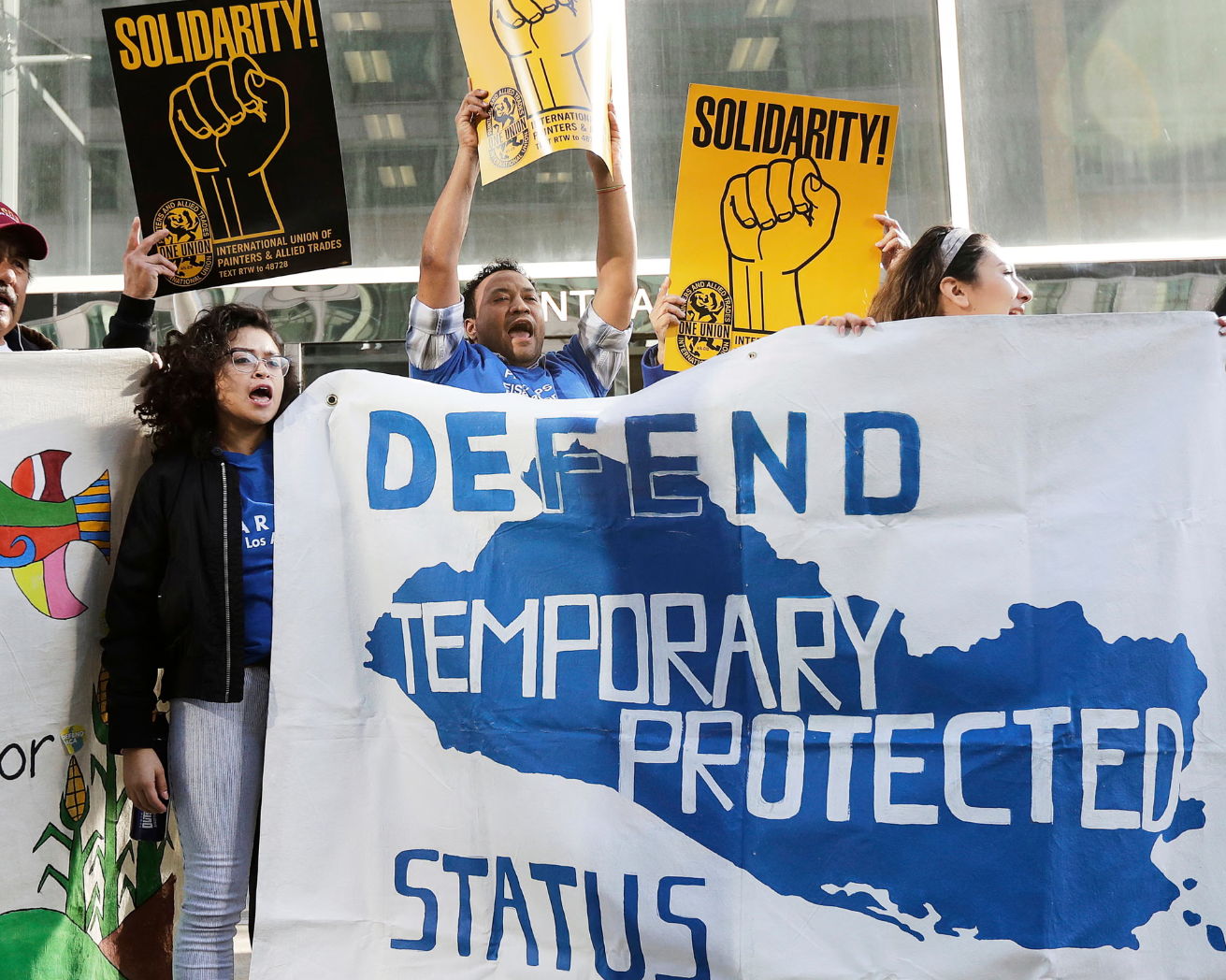 US court allows Trump officials to end protected status for 60,000 migrants