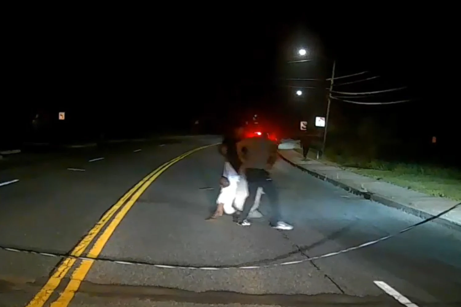 Army football player and father rescue man from burning car