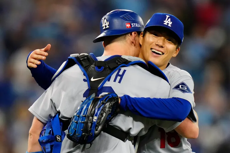 Yamamoto throws complete game as Dodgers beat Blue Jays 5-1 in World Series Game 2