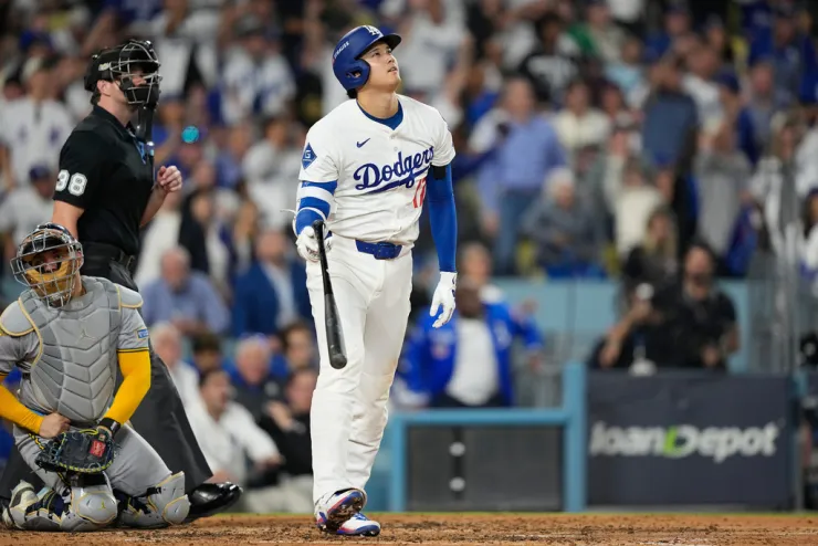 Ohtani hits 3 homers, dominates on mound as Dodgers sweep Brewers in NLCS