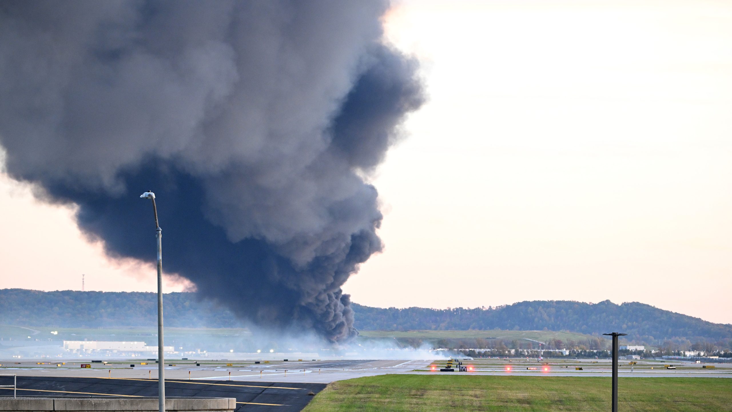 At least 12 dead after engine separated from plane during takeoff in UPS crash at Louisville airport: Officials