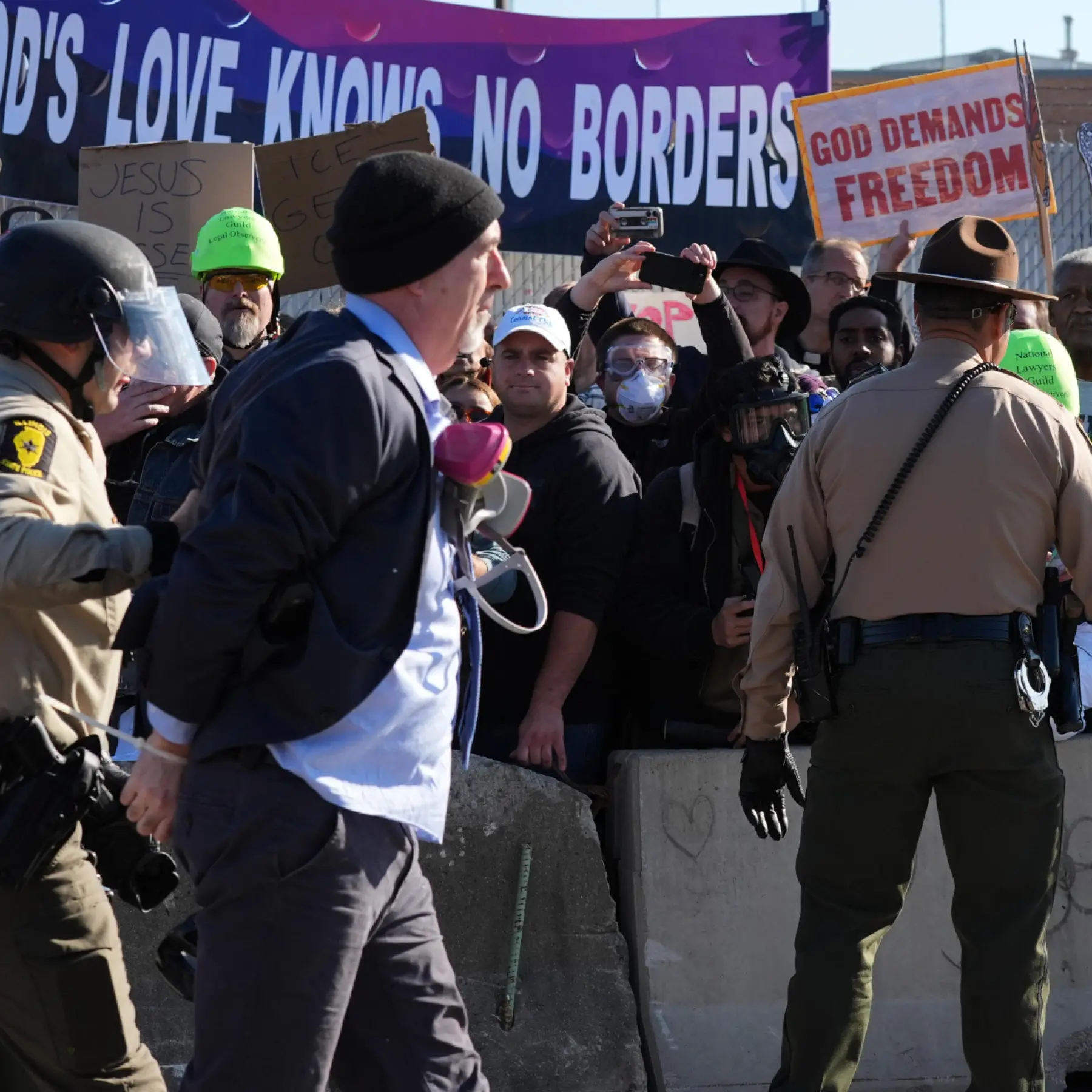 Protesters arrested after clashing with police outside Chicago-area immigration facility