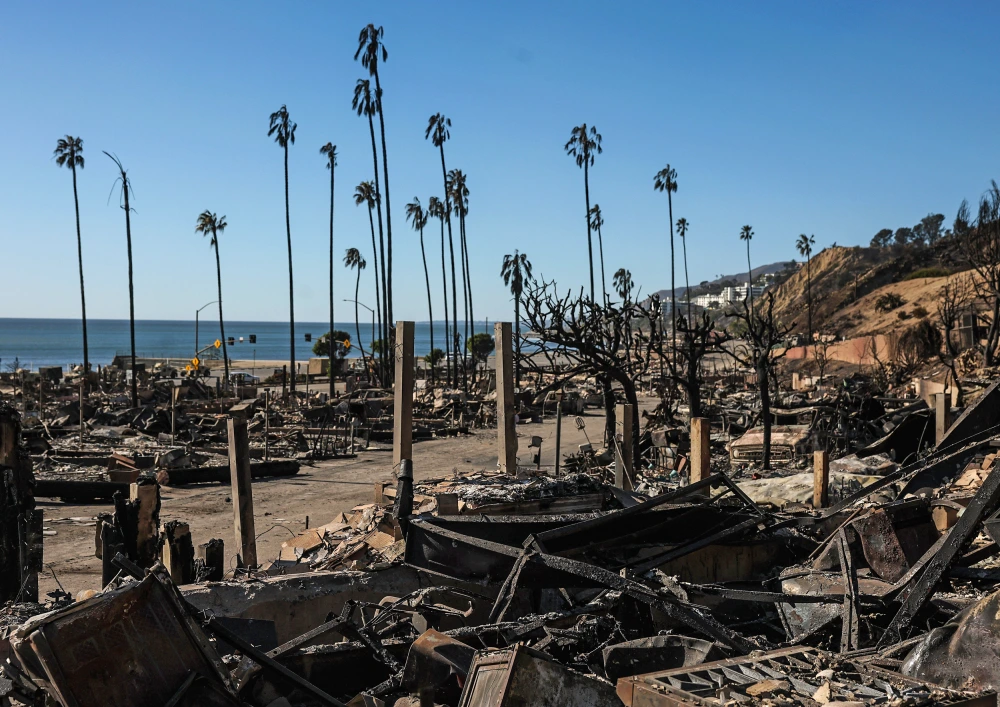 Rapper charged with raping 2 women in area left desolate by California wildfire