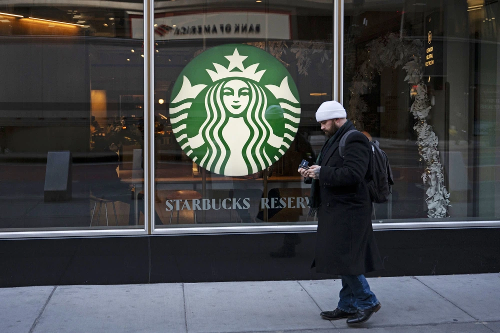 Starbucks to pay about $35M to NYC workers to settle claims it violated labor law
