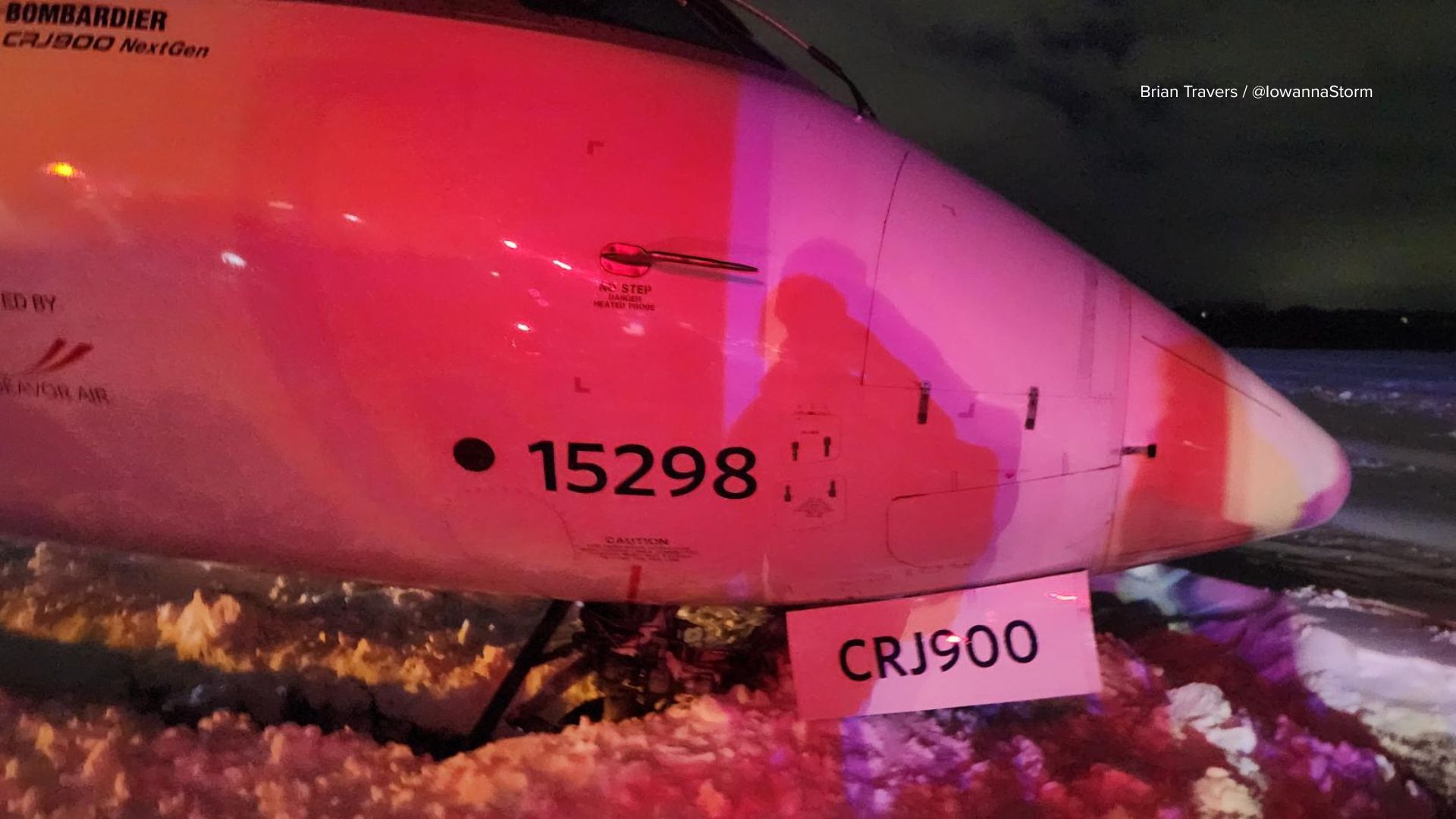 Plane skids off icy runway as snow snarls post-Thanksgiving travel