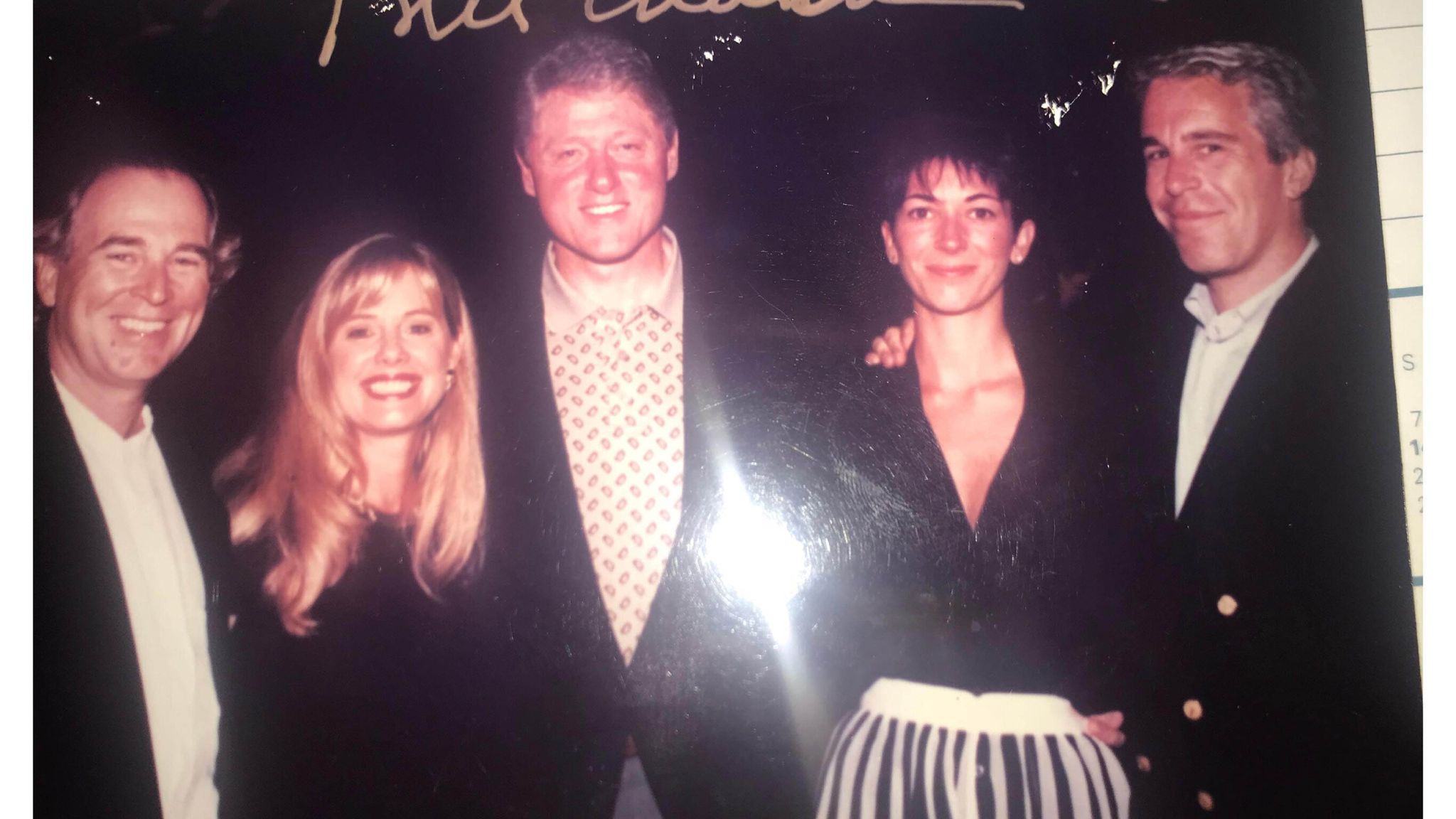 Newly released photos from Epstein estate include images of Trump, Clinton