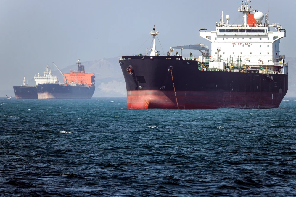 U.S. commercial ships had military security aboard during Hormuz transit, sources say